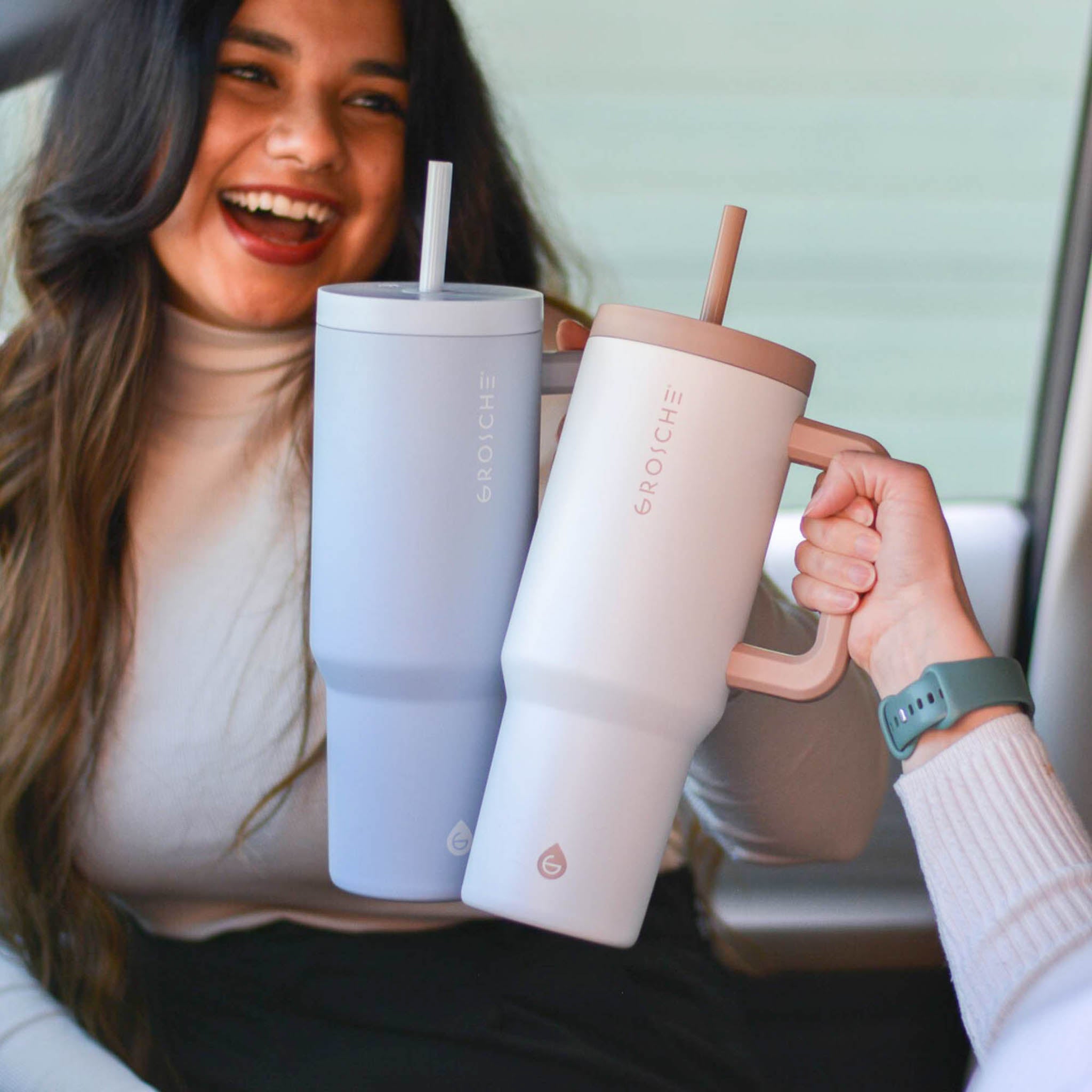 woman with two aspen 40oz, cream white and slate blue color