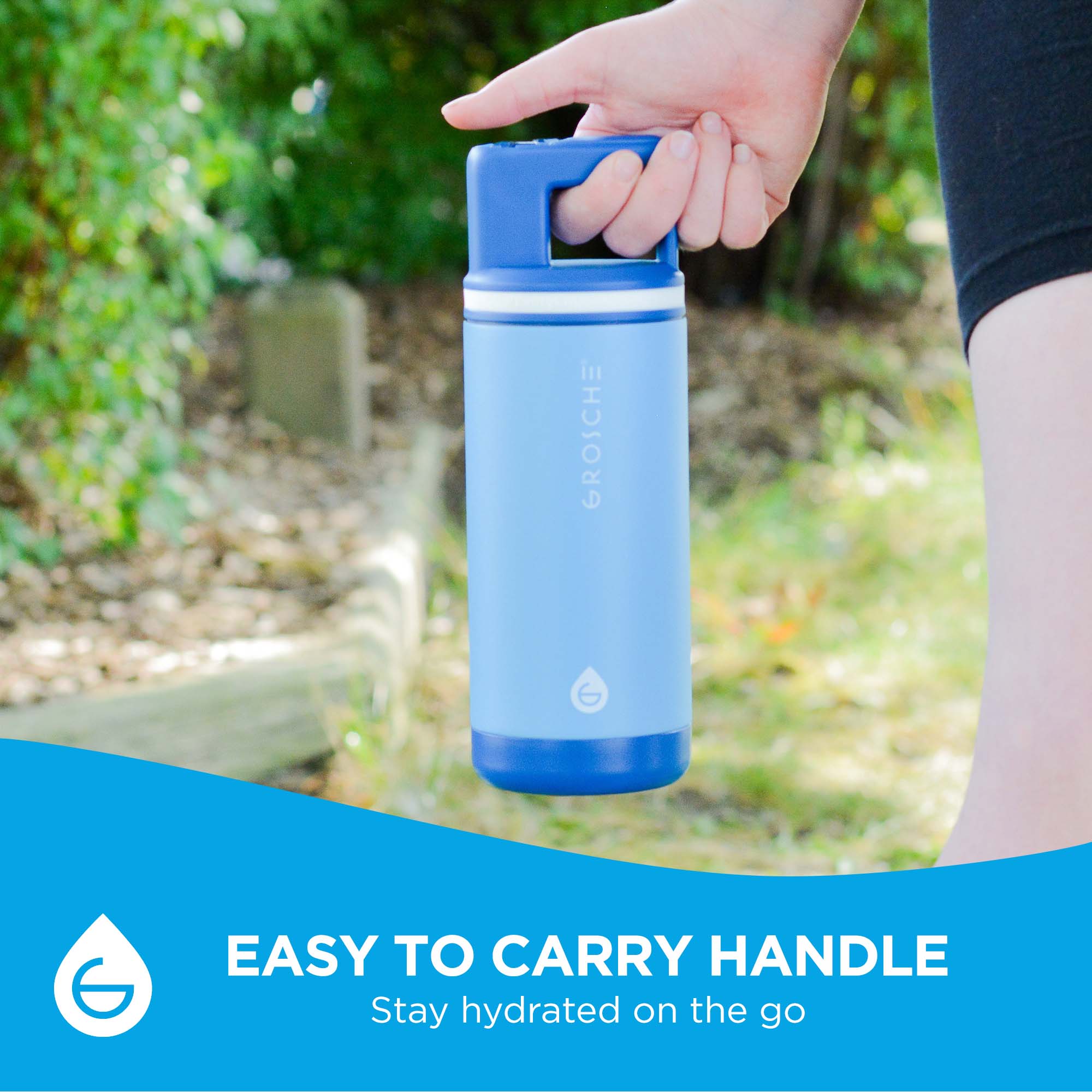 A person holding the Alpine ids water bottle in Scuba Blue, showcasing the easy to carry handle. 