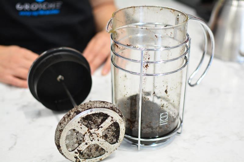 How to remove coffee grounds from french press