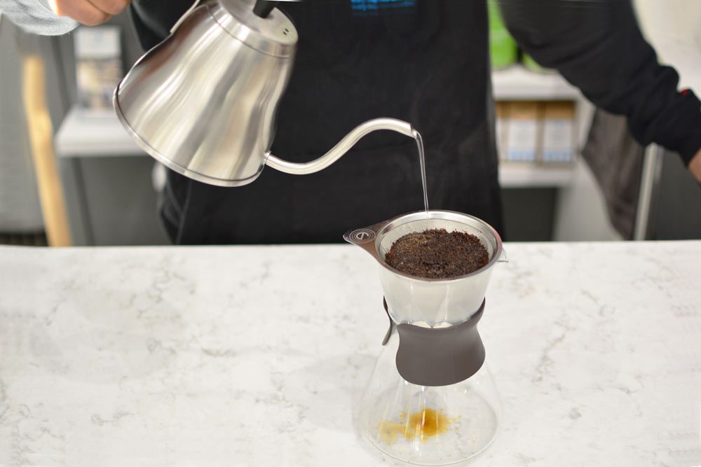 Pouring-water-into-a-portland-pour-over-coffee-maker-Grosche-Coffee-1000-web