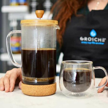 Grosche-Melbourne-Cork-and-bamboo-french-press-on-counter-with-coffee-and-barista-coffee-water-ratio