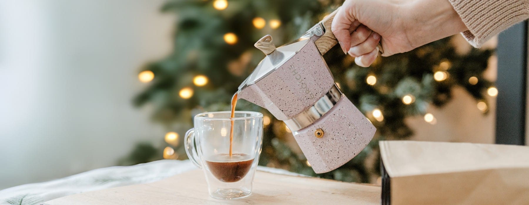 Milano Stone Pink pouring Moka Coffee with christmas background